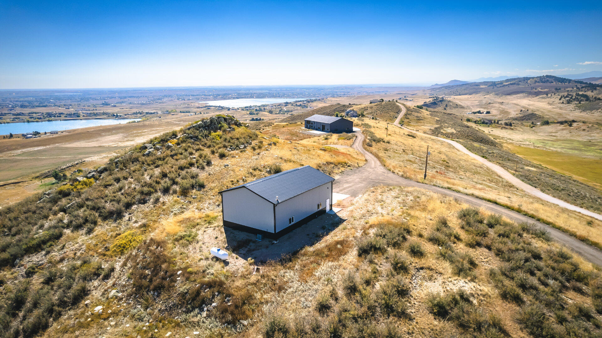 Aerial of barn &amp; house from northwest
