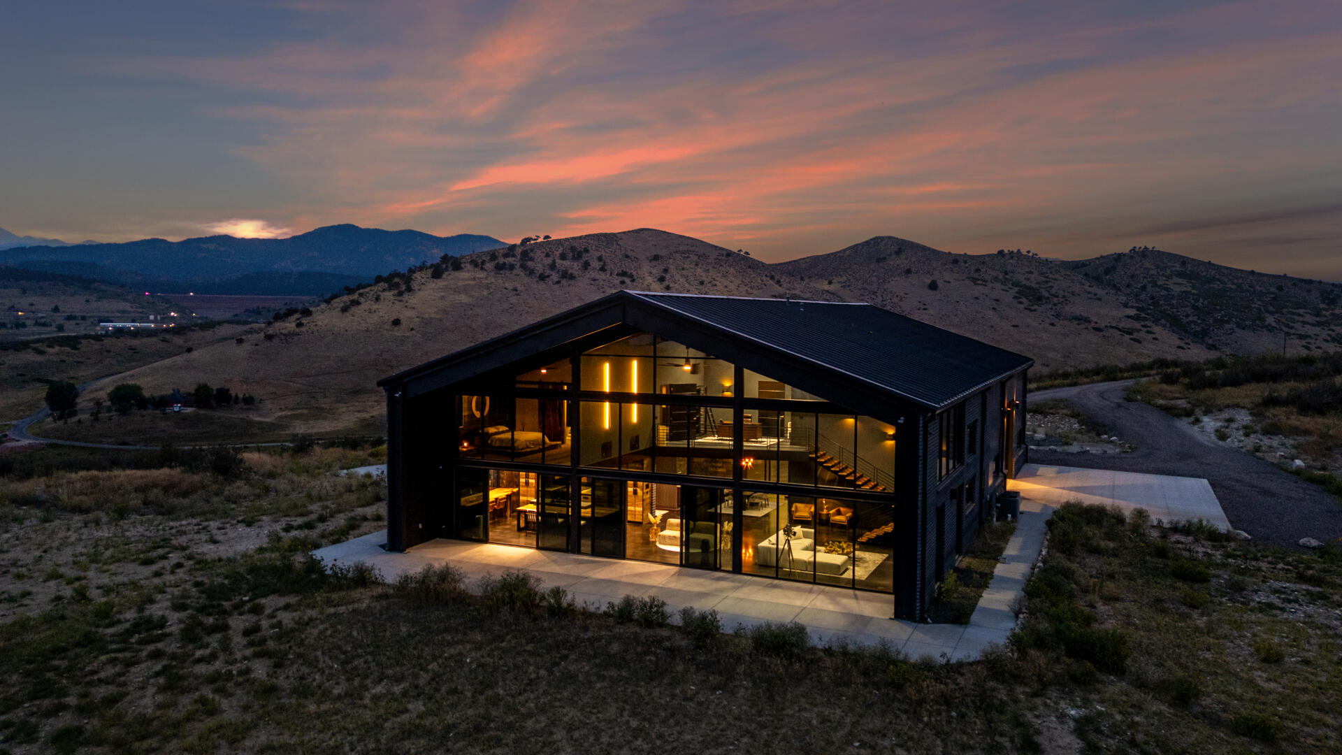 Kiva House front aerial view at twilight